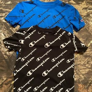 2 YL Champion shirts